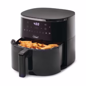Une friteuse à air ouverte contenant des aliments en cuisson.